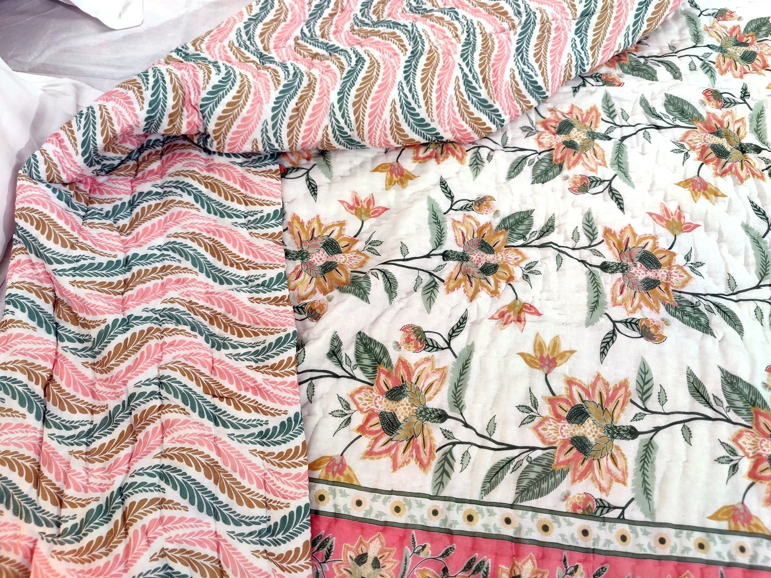 Jaipuri cotton quilt double bed with colorful floral and wave patterns for vibrant home decor